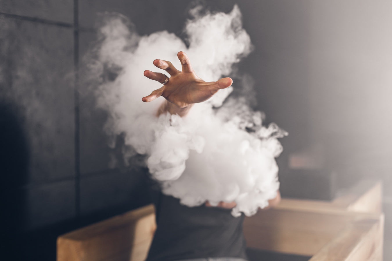 Man engulfed in large vape cloud while cloud chasing