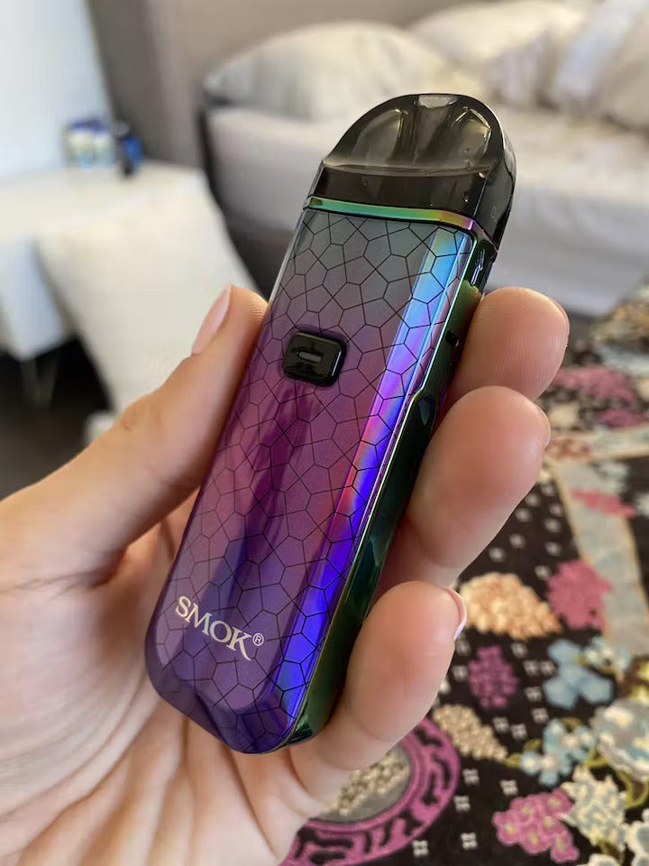 Customer holding SMOK Nord Pro in hand