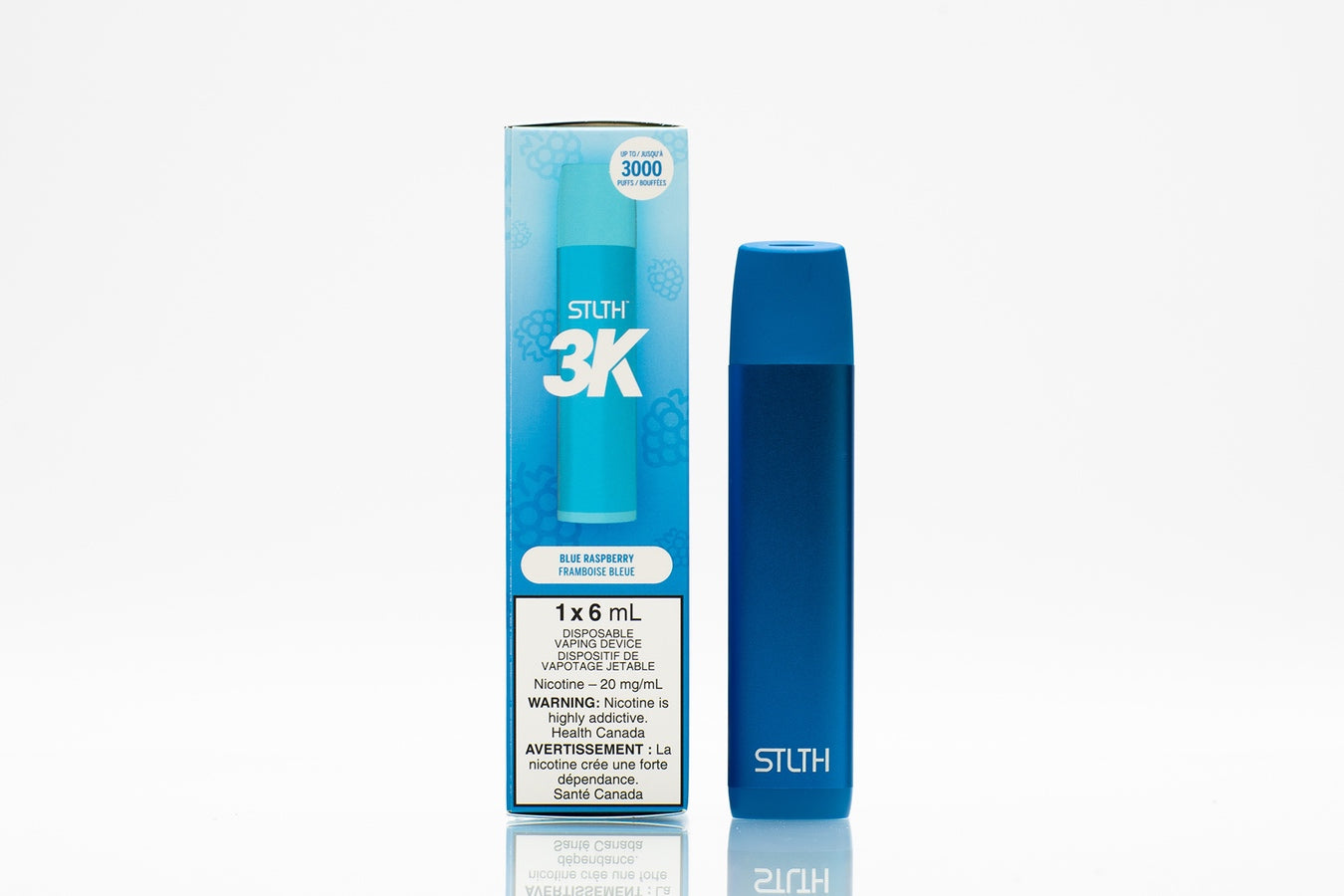 STLTH 3K disposable vape device next to packaging