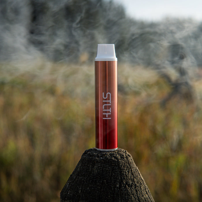 STLTH Eco sitting on a post in a field