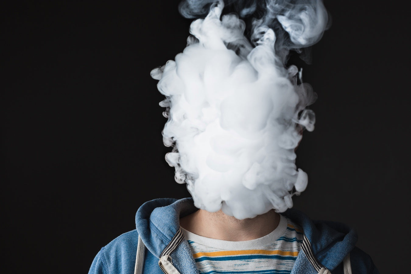 Man practicing inhalation technique for cloud chasing