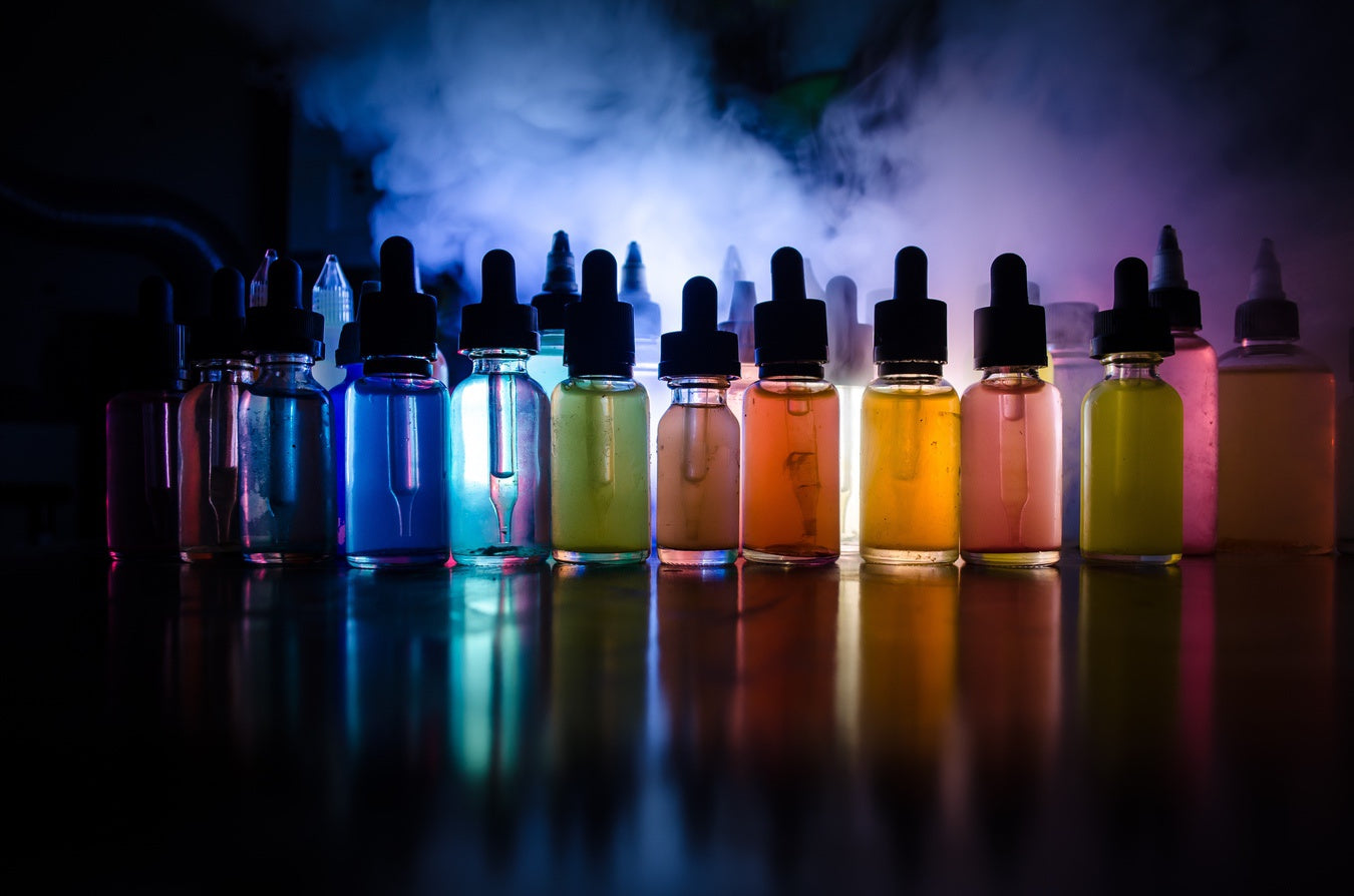 Various e-liquids in containers