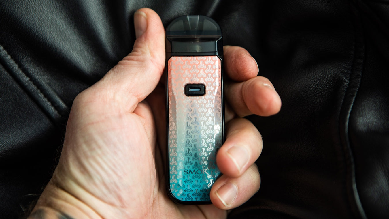 Hand holding Smok Nord 5 device