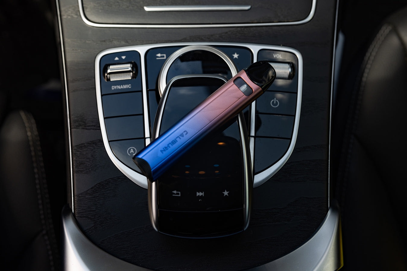 UWell Caliburn A3S resting on side in car between uses