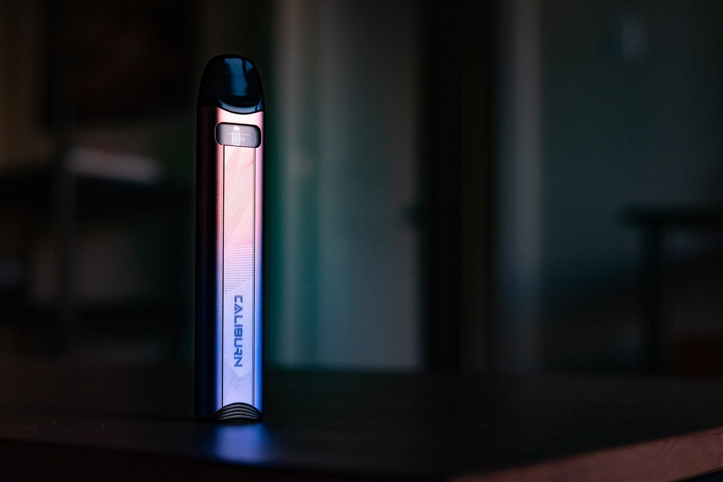 UWell Caliburn A3S pod system standing upright with pod installed