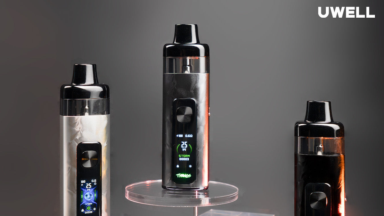 Three UWell Typhos vape devices in Starlight Silver, Cement Grey and Polar Black against a seamless grey background